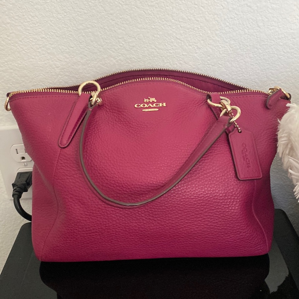 Beautiful hot pink Coach purse with same color strap, clean condition!